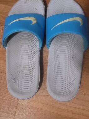 Nike Womens Blue Slide Sandals with Yellow Swoosh Accent